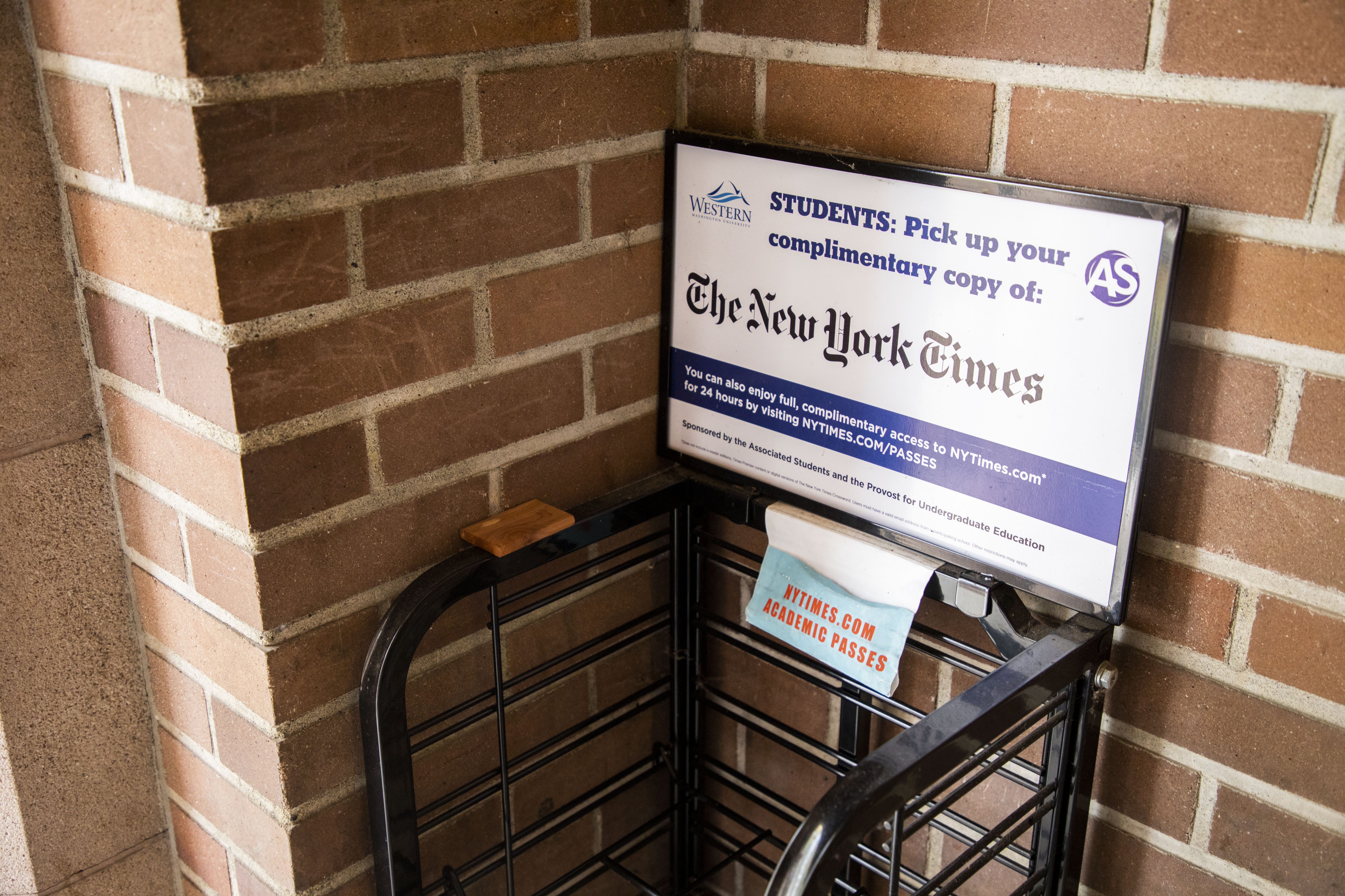 An empty rack outside Wilson Library that used to hold The New York Times. Ella Banken//AS Review