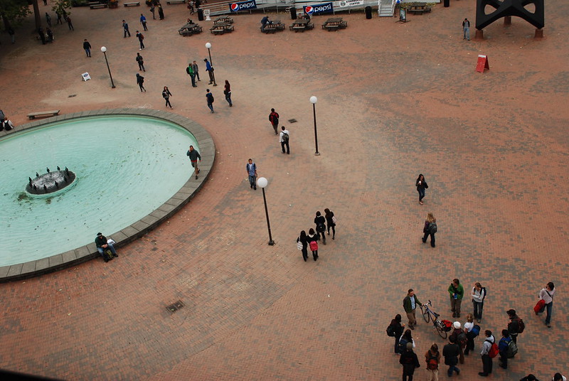 Image of Red Square and Fisher Fountain with students milling about.